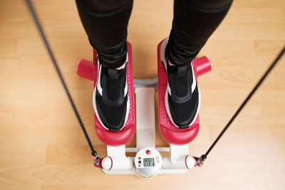 Top view on women legs doing exercise on the twist