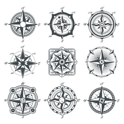 Different vintage compasses set
