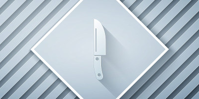 Paper cut Knife icon isolated on grey background. 