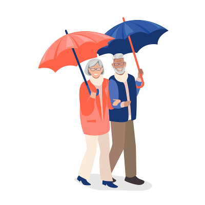 一对老夫妇走在雨伞下