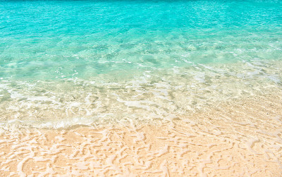 波浪水背景上的沙子