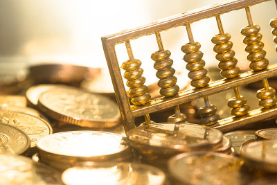 金算盘放在金币上