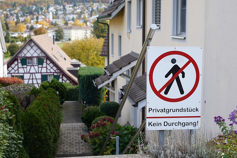 Residential district in a Swiss village with a shi