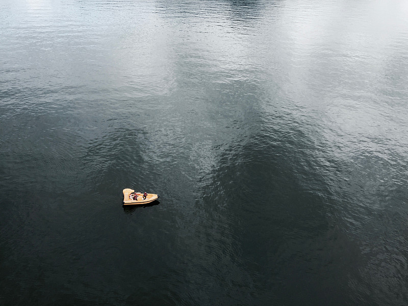 Aerial view of man on rubber boat