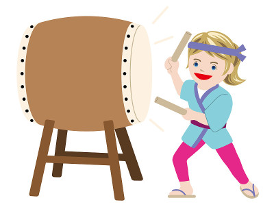 Woman performing traditional taiko drum.