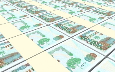 阿尔及利亚第纳尔钞票堆积背景。