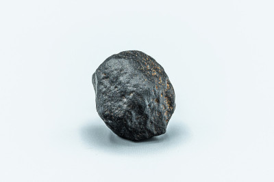 Black magnetic Tektite Meteorite isolated, piece o