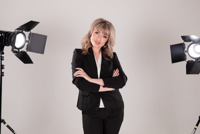 Young beautiful model posing in professionally equ