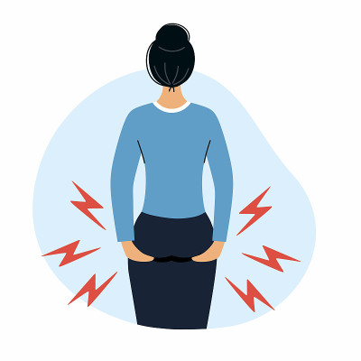 女人把手放在屁股上。痔疮和健康问题。