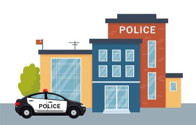 警察局大楼外有警车。
