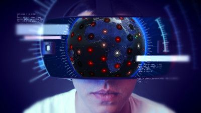 帅气的年轻人戴着VR头戴体验虚拟现实。