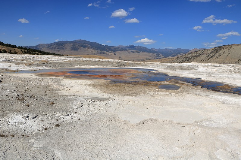 Salt flats with Absaroka mountains in distance, Ye