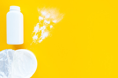 Set of children's cosmetics on a yellow background