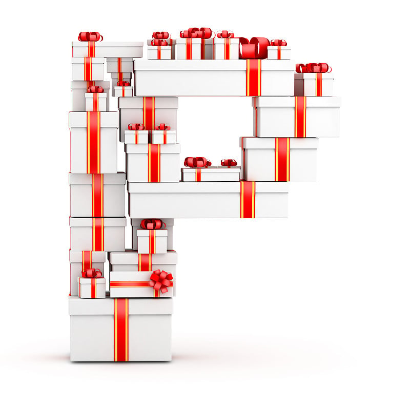 用红丝带装饰的礼物盒子里的字母P