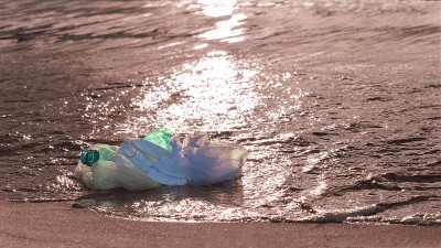 Plastic waste - medical mask, plastic bottle and b