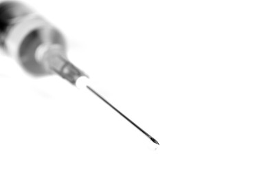Close-up syringe on isolated white background