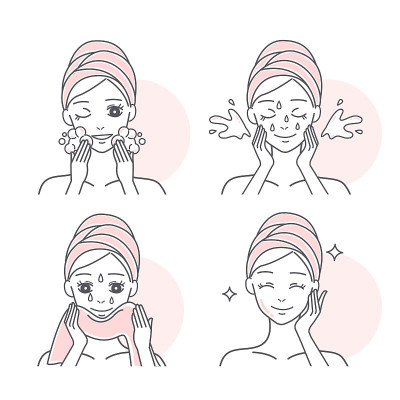 woman washing her face