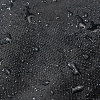 深灰色防水防水布特写与水滴选择焦点背景
