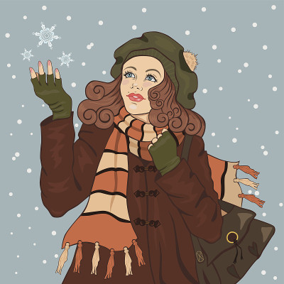 年轻的女孩捕捉雪花