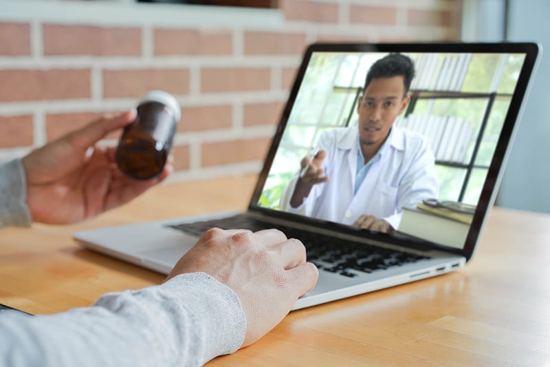 close up man open laptop to using video conference