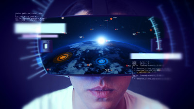 帅气的年轻人戴着VR头戴体验虚拟现实。