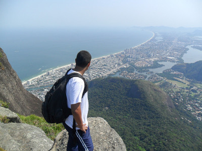 man admiring the look of the top of the Gavea ston