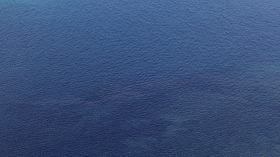 真实世界海洋表面的海洋蓝色背景