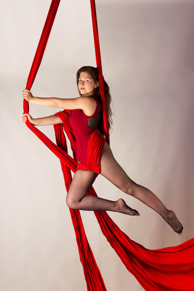 Girl training on aerial silks
