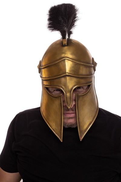 Man in historical copy helmet Spartan warrior on a