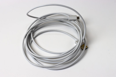 Twisted long usb cable isolated on white backgroun