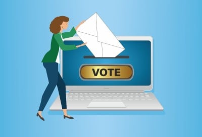 Online voting. Woman leaving here vote for electio