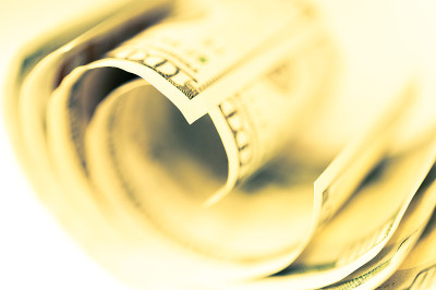 近距离查看现金美元。财务和商业概念。景深浅。