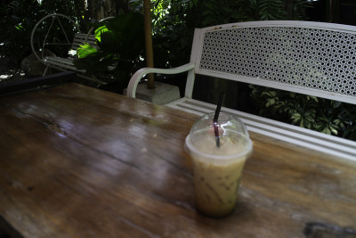Iced coffee drink in resort garden