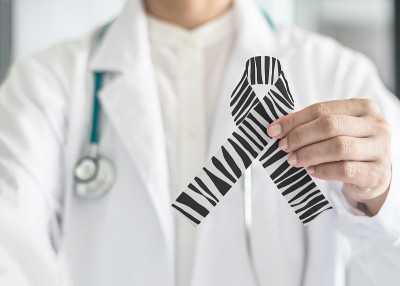 类癌意识缎带斑马条纹黑白图案象征蝴蝶结颜色上doctorâ的手支持