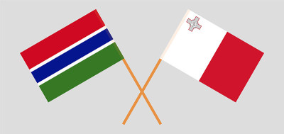 Crossed flags of Malta and the Gambia