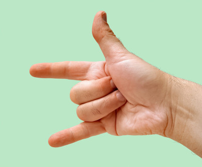 Closed hand with open thumb, index and little fing