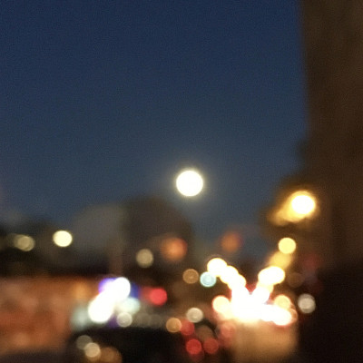 Blurry City with Huge Moon
