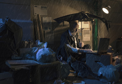 破产的无业商人坐在雨中的街道上