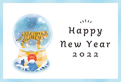 2022年虎年的雪景玻璃球，上面画着老虎和幸运符