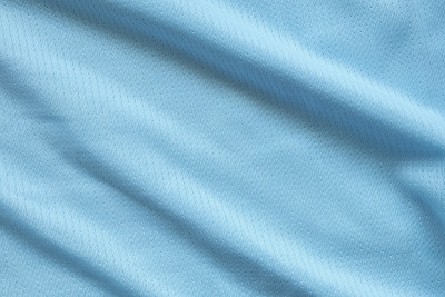 蓝色足球运动衫服装面料质地运动服背景