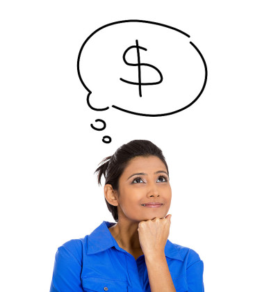 Young woman dreaming of financial success