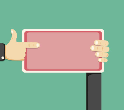 Hand holding sign