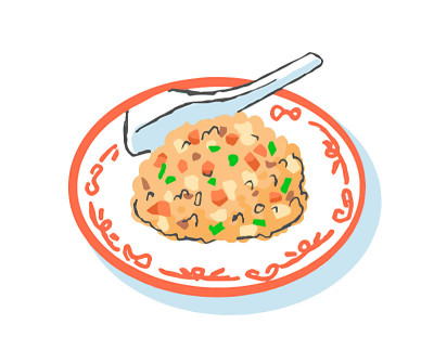 一碟炒饭和一个中国汤勺