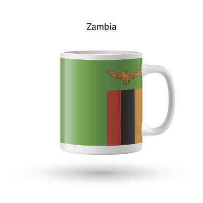 Zambia flag souvenir mug on white background.