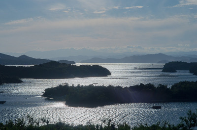 前海湾剪影日落天空，三重日本旅游