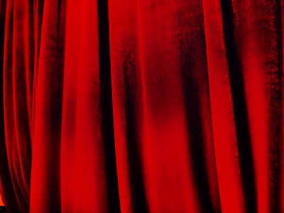 Bright red abstract background reminiscent of plea