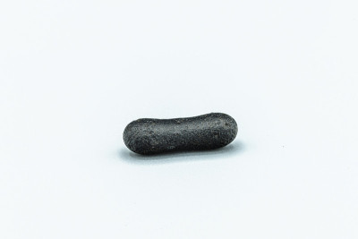 Black magnetic Tektite Meteorite isolated, piece o