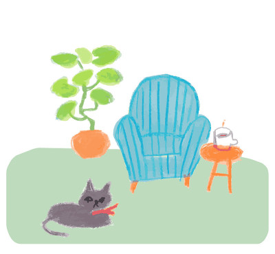 有浅蓝色沙发和黑猫的房间