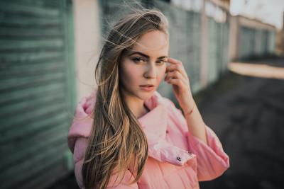 Young gorgeous blonde girl dressed fashion pink ja