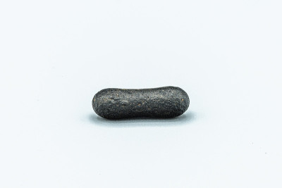 Black magnetic Tektite Meteorite isolated, piece o